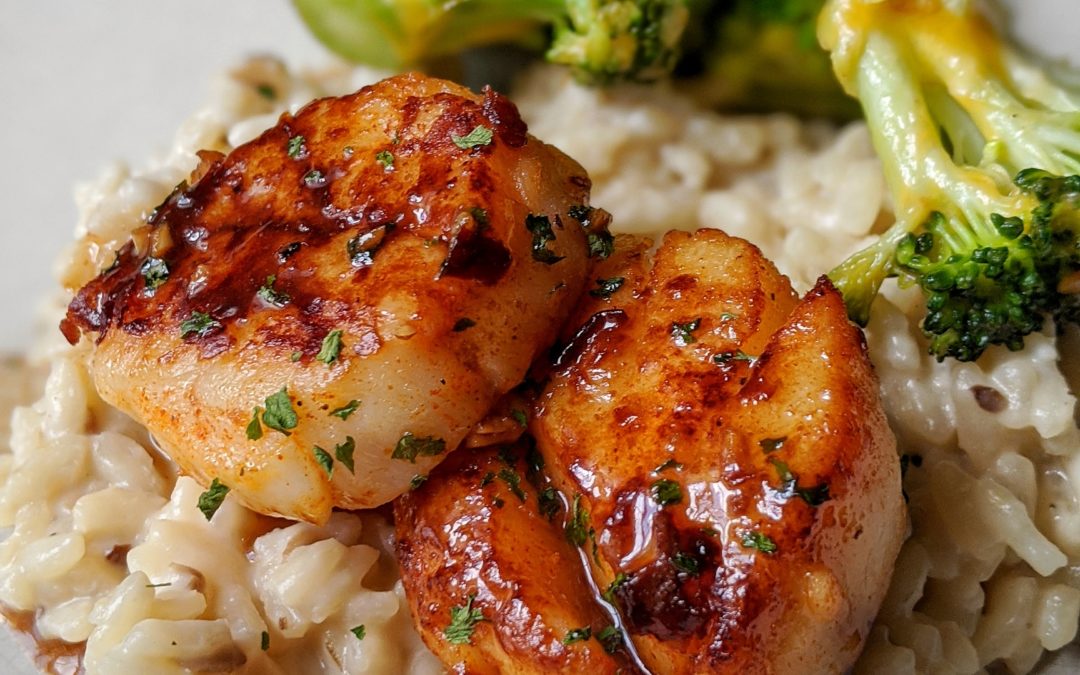 Smoked Paprika Scallops With Garlic Lemon Butter Sauce Served Over Truffle Risotto Cheesy Broccoli Banner Butter Atlanta